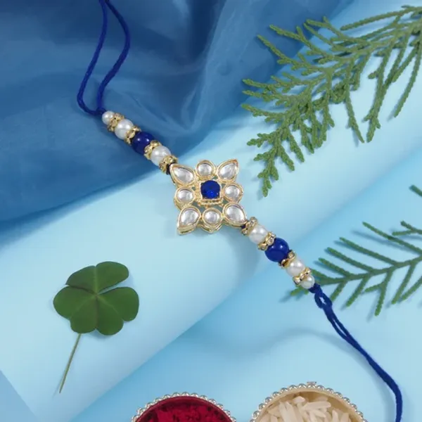 Delicate_Pearl_Beads_Blue_Rakhi_with_Roli_Chawal_&_Rakshabandhan_Card