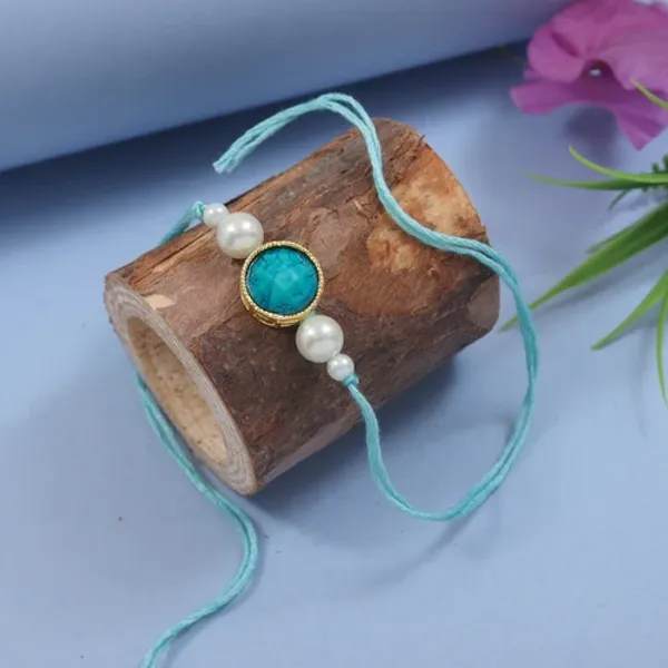 Delicate_Pearl_Beads_Marble_Finish_Turquoise_Rakhi_with_Roli_Chawal_&_Rakshabandhan_Card