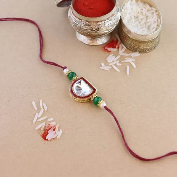 Dazzling_Pearl_Kundan_Stone_Rakhi_with_Roli_Chawal_&_Card