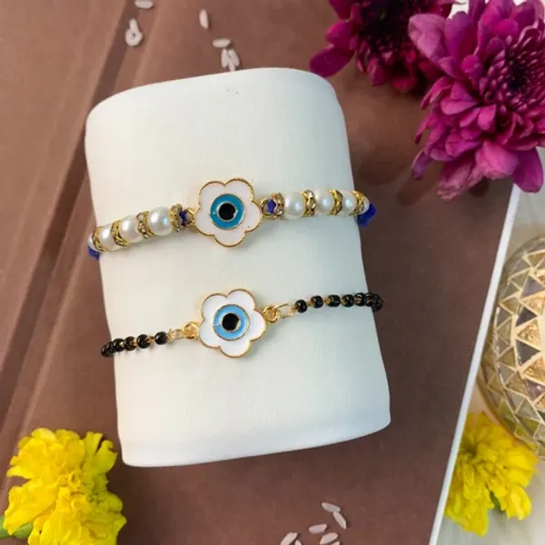 Floral_Shape_Enamel_Bhaiya_Bhabhi_Lumba_Mangalsutra_Bracelet_&_Rakhi_With_Roli_Chawal_&_Card