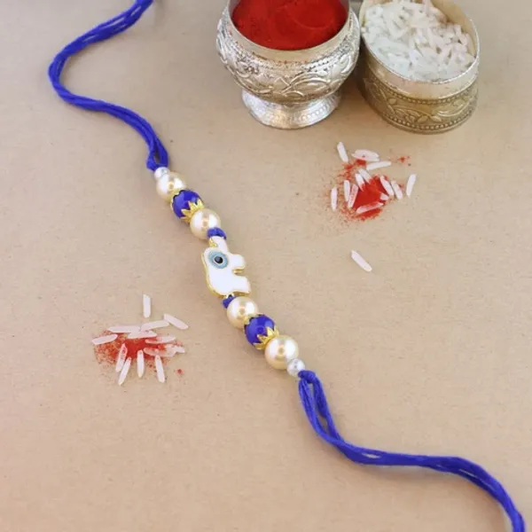 Elephant_Shape_Enamel_Bhaiya_Rakhi_With_Roli_Chawal_&_Card