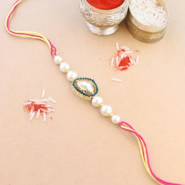 Beautiful_Kundan_&_Pearl_Rakhi_with_Roli_Chawal_&_Card