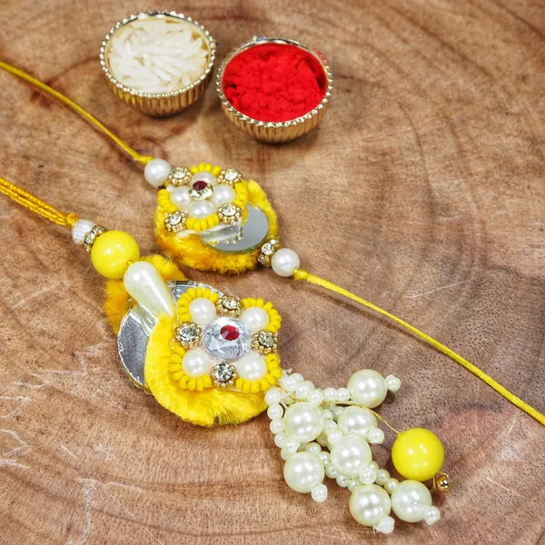 Yellow_White_Pearl_Bead_Bhaiya_Bhabhi_Rakhi_With_Roli_and_Chawal