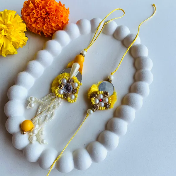 Yellow_White_Pearl_Bead_Bhaiya_Bhabhi_Rakhi_With_Roli_and_Chawal