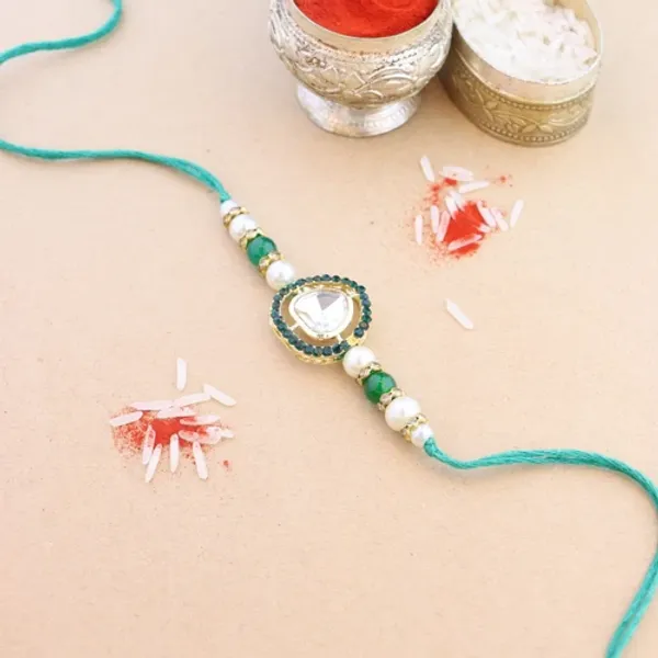 Beautiful_Kundan_&_Pearl_Rakhi_with_Roli_Chawal_&_Card