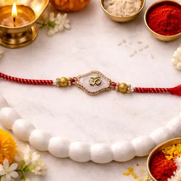 Om_White_Enamel_Rakh_iwith_Roli_Chawal_&_Rakshabandhan_Card