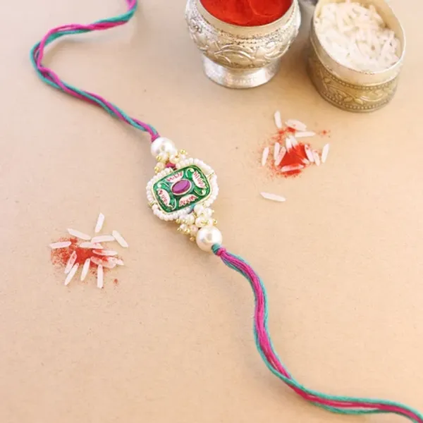 Mesmerizing_Kundan_And_Meena_Rakhi_With_Roli_Chawal_&_Card