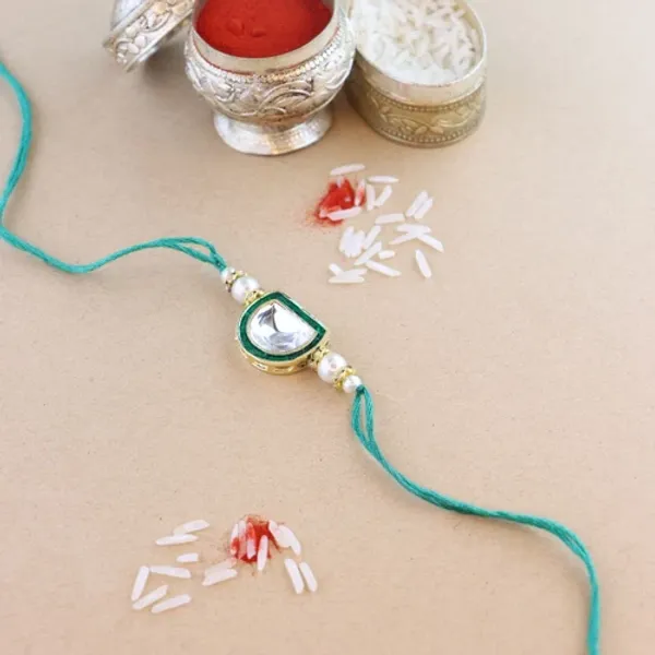 Dazzling_Pearl_Kundan_Stone_Rakhi_with_Roli_Chawal_&_Card