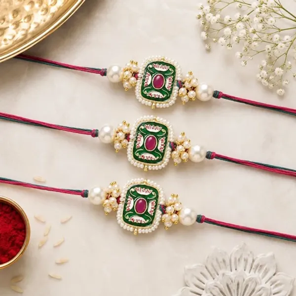 Mesmerizing_Kundan_And_Meena_Rakhi_With_Roli_Chawal_&_Card_(Pack_of_3)