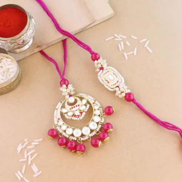 Elegant_Bhaiya_Bhabhi_Lumba_&_Pearl_Rakhi_With_Roli_Chawal_&_Card