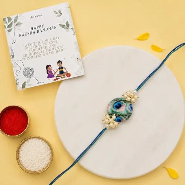 Beautiful_Peacock_Feather_Rakhi_with_Roli_Chawal_&_Card