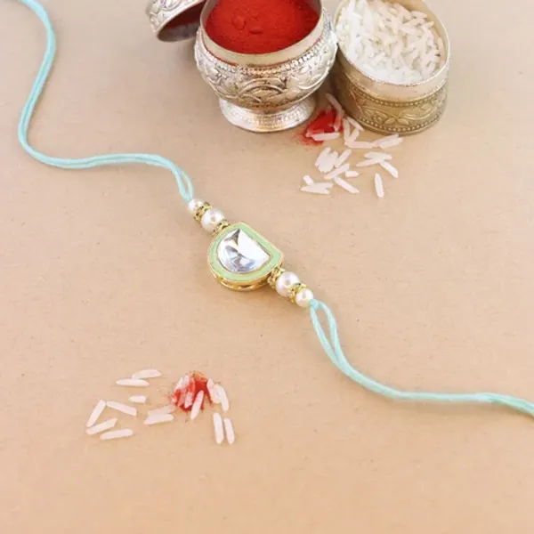 Dazzling_Pearl_Kundan_Stone_Rakhi_with_Roli_Chawal_&_Card
