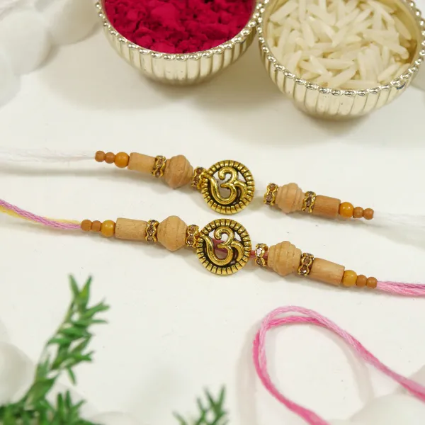Antique_OM_Rakhi_Combo_For_Bhai_-_Pack_of_2_with_Roli_Chawal