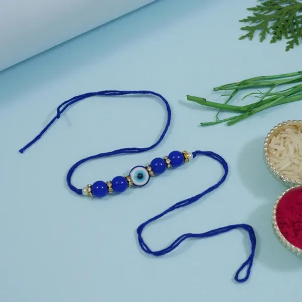 Elegant_Bhaiya_Bhabhi_Wrap_Around_Lumba_Pearl_Rakhi_With_Roli_Chawal_&_Rakshabandhan_Card