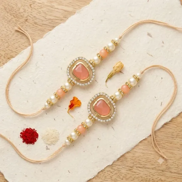Dazzling_Pearl_Kundan_Stone_Rakhi_with_Roli_Chawal_&_Card_(Pack_of_2)