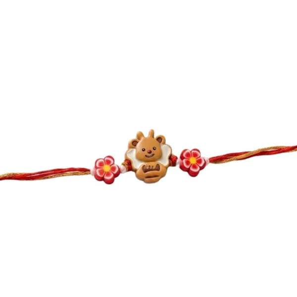 Cartoon_Bear_with_Roli_Chawal_and_Rakshabandhan_Card
