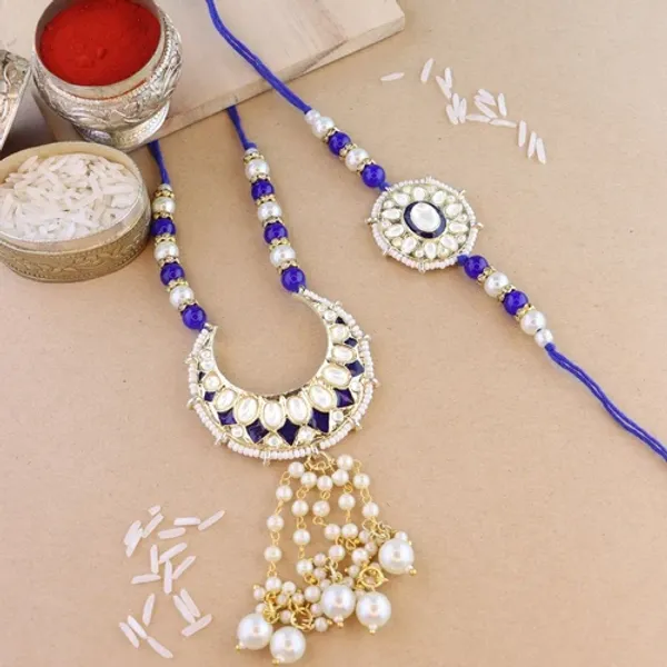 Elegant_Bhaiya_Bhabhi_Lumba_&_Pearl_Rakhi_With_Roli_Chawal_&_Card