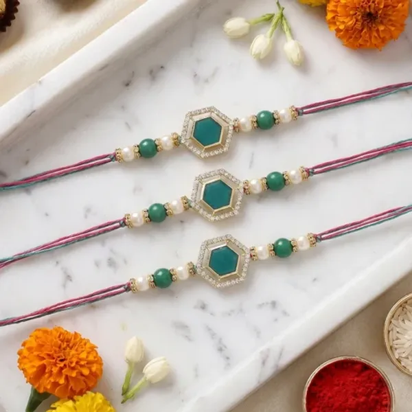 Beautiful_Kundan_&_Pearl_Rakhi_with_Roli_Chawal_&_Card_(Pack_of_3)