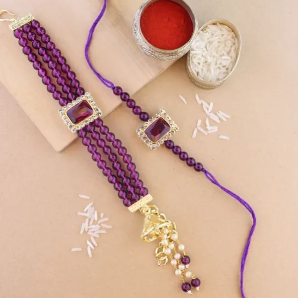 Elegant_Bhaiya_Bhabhi_Lumba_&_Pearl_Rakhi_With_Roli_Chawal_&_Card