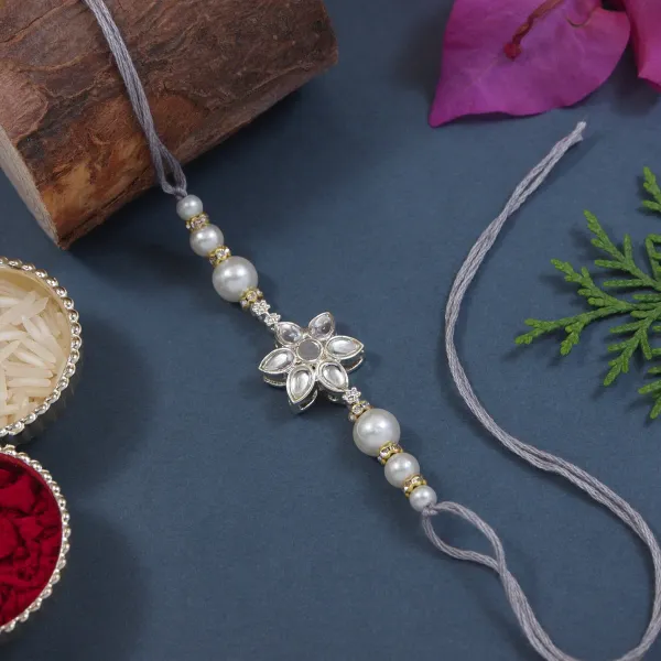 Delicate_Pearl_Beads_Grey_Rakhi_with_Roli_Chawal_&_Rakshabandhan_Card