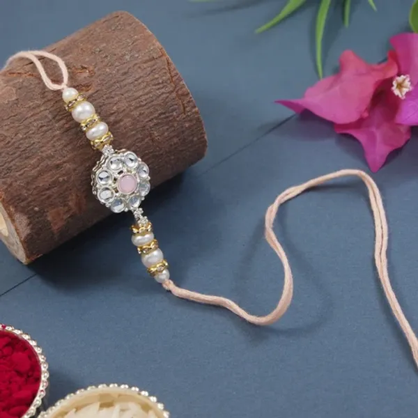 Delicate_Pearl_Beads_Peach_Rakhi_with_Roli_Chawal_&_Rakshabandhan_Card