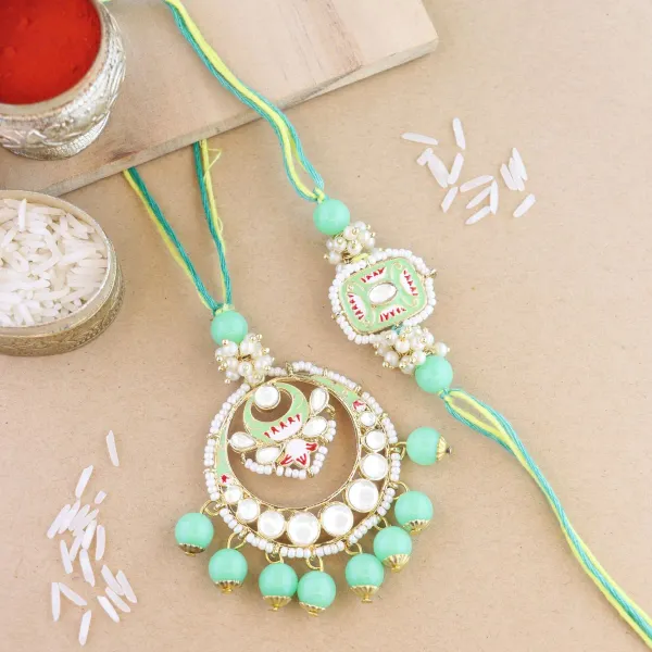 Elegant_Bhaiya_Bhabhi_Lumba_&_Pearl_Rakhi_With_Roli_Chawal_&_Card