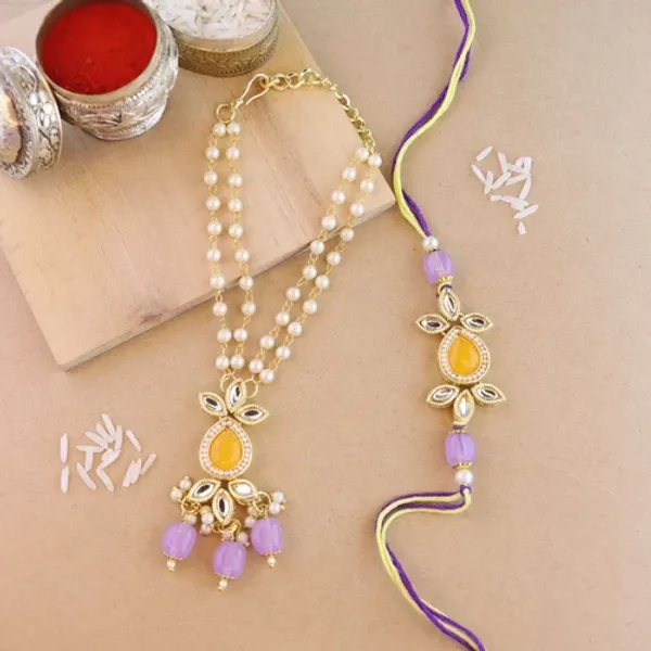 Elegant_Bhaiya_Bhabhi_Lumba_Pearl_&_Rakhi_With_Roli_Chawal_&_Card