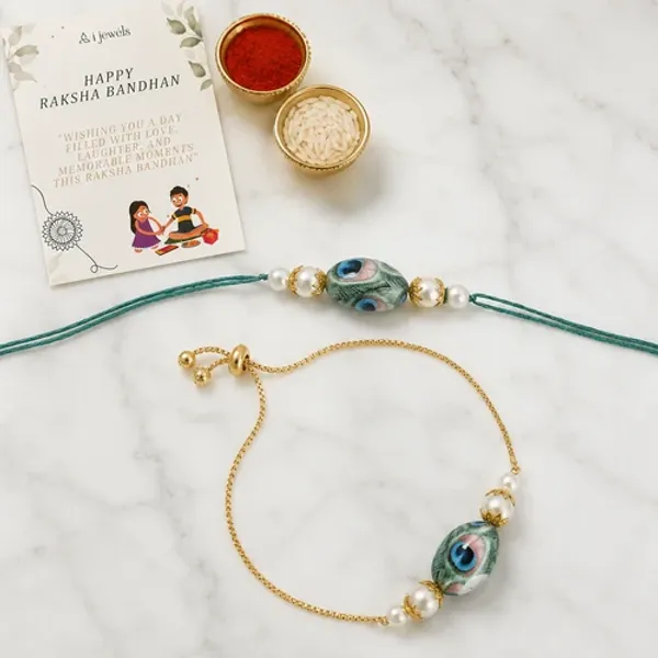 Elegant_Bhaiya_Bhabhi_Lumba_Peacock_Feather_Rakhi_With_Roli_Chawal_&_Card