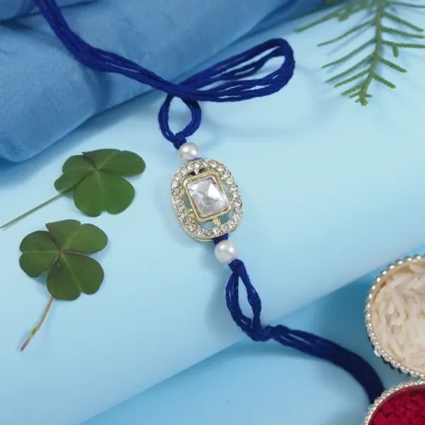 Delicate_Pearl_Beads_Blue_Rakhi_with_Roli_Chawal_&_Rakshabandhan_Card