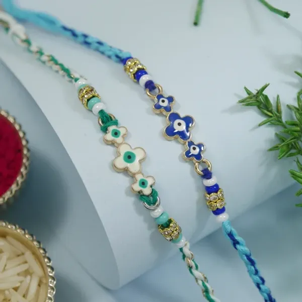 Minimalist_Evil_Eye_Rakhis_With_Roli_Chawal_&_Rakshabandhan_Card_(Pack_of_2)