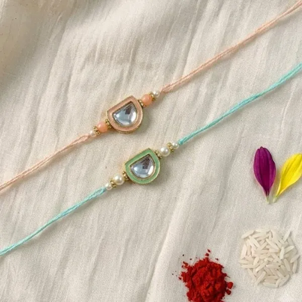 Dazzling_Pearl_Kundan_Stone_Rakhi_with_Roli_Chawal_&_Card_(Pack_of_2)