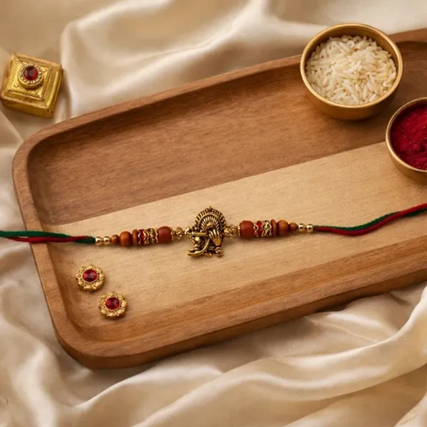 Peacock_Feather_Krishna_Flute_Rakhi_with_Roli_Chawal_&_Rakshabandhan_Card