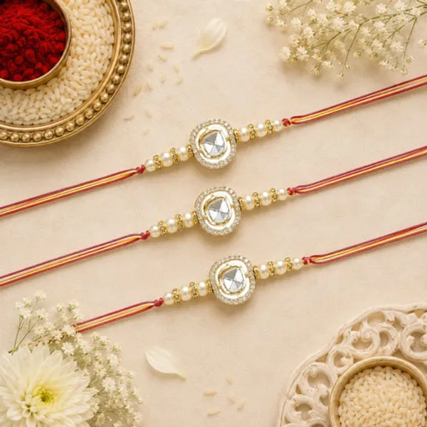 Dazzling_Pearl_Kundan_Stone_Rakhi_with_Roli_Chawal_&_Card_(Pack_of_3)