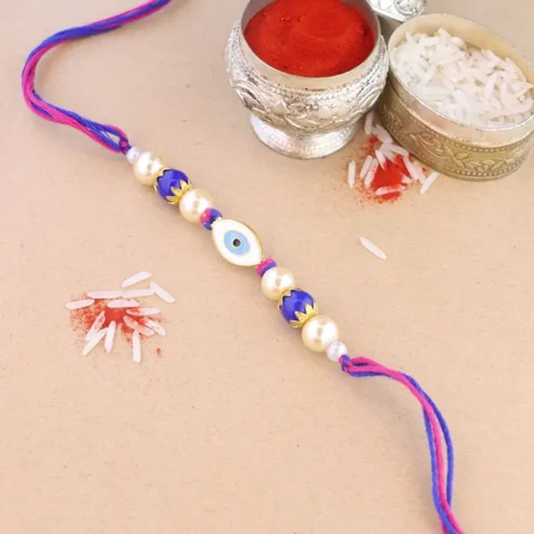 Evil_Eye_Shape_Enamel_Bhaiya_Rakhi_With_Roli_Chawal_&_Card