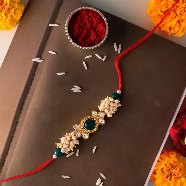 Green_And_White_Thread_Beaded_Rakhi_For_Raksha_Bandhan_For_Brother