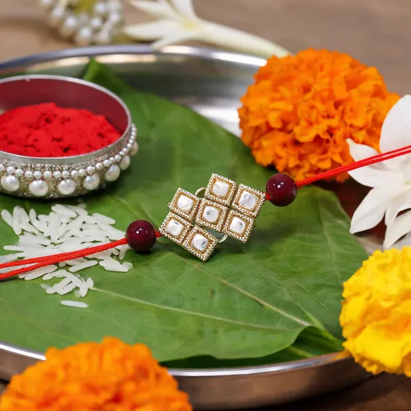 Gold_Plated_Ethnic_Designer_Kundan_Pearl_Rakhi_for_Brother/Men