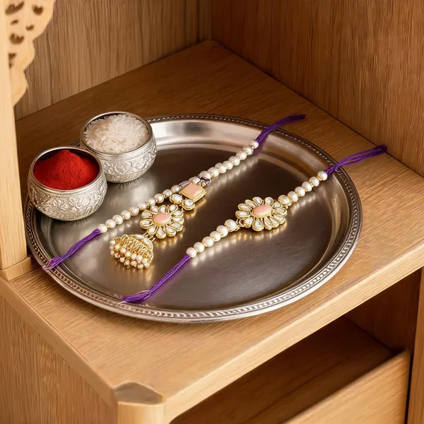 Elegant_Bhaiya_Bhabhi_Lumba_&_Pearl_Rakhi_With_Roli_Chawal_&_Card