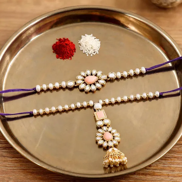 Elegant_Bhaiya_Bhabhi_Lumba_&_Pearl_Rakhi_With_Roli_Chawal_&_Card