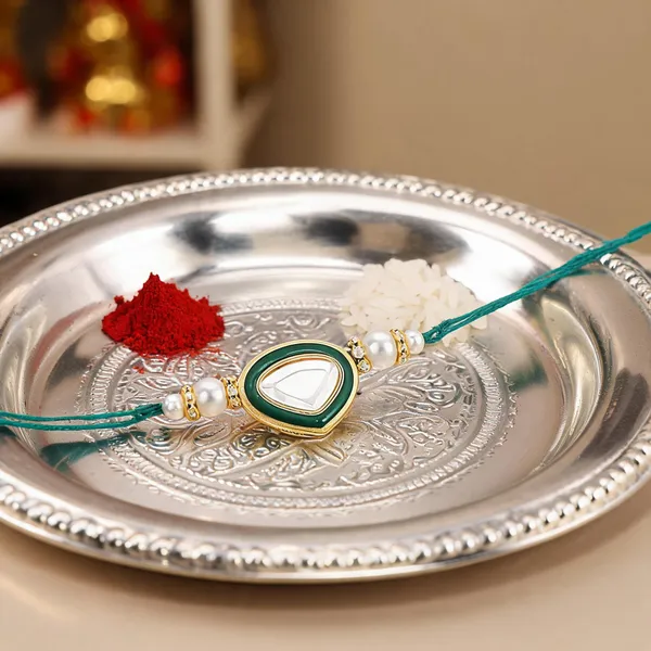 Dazzling_Pearl_Kundan_Stone_Rakhi_with_Roli_Chawal_&_Card