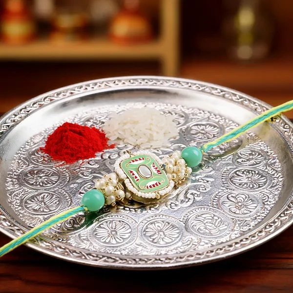 Mesmerizing_Kundan_And_Meena_Rakhi_With_Roli_Chawal_&_Card