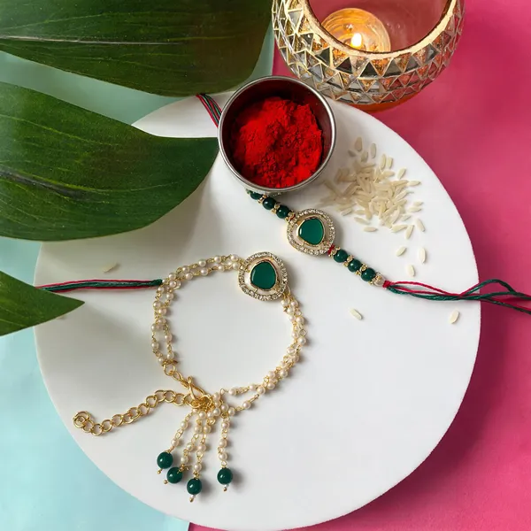 Elegant_Bhaiya_Bhabhi_Lumba_&_Pearl_Rakhi_With_Roli_Chawal_&_Card