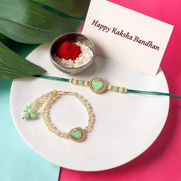 Elegant_Bhaiya_Bhabhi_Lumba_&_Pearl_Rakhi_With_Roli_Chawal_&_Card