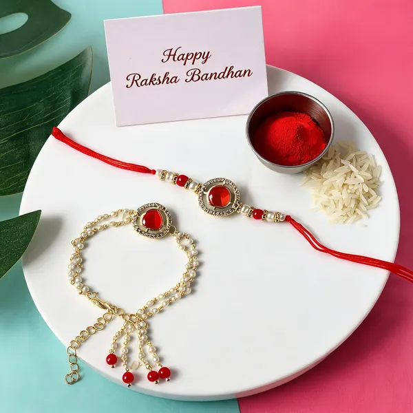 Elegant_Bhaiya_Bhabhi_Lumba_&_Pearl_Rakhi_With_Roli_Chawal_&_Card