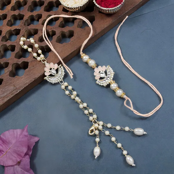 Elegant_Bhaiya_Bhabhi_Lumba_Pearl_Peach_Rakhi_With_Roli_Chawal_&Card