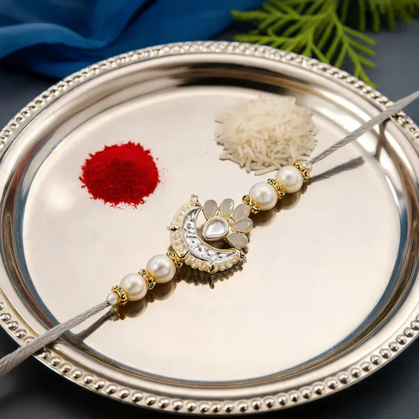 Delicate_Pearl_Beads_Grey_Rakhi_with_Roli_Chawal_&_Rakshabandhan_Card