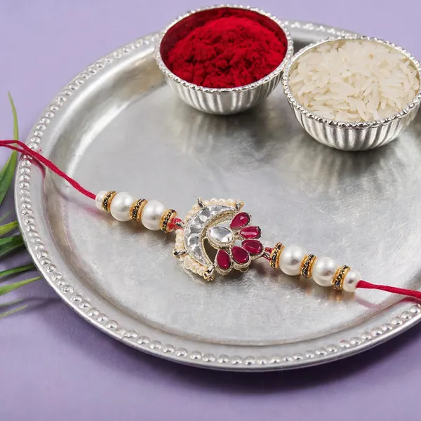 Delicate_Pearl_Beads_Pink_Rakhi_with_Roli_Chawal_&_Rakshabandhan_Card