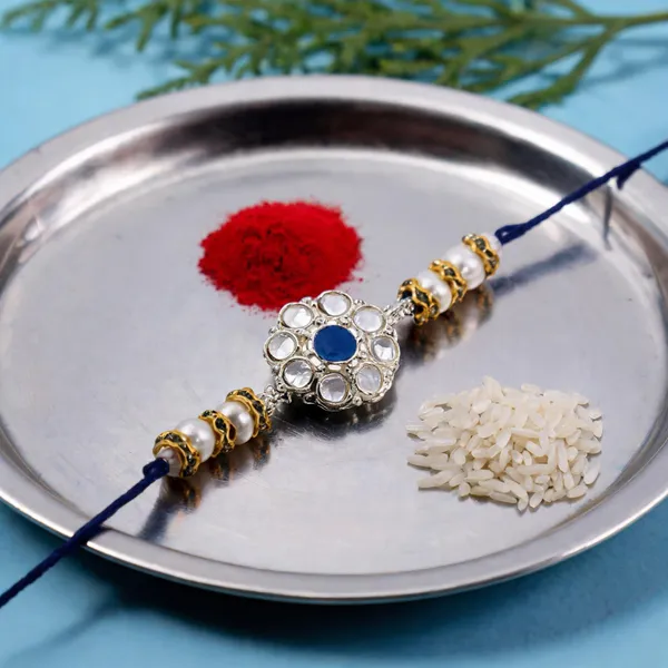 Delicate_Pearl_Beads_Blue_Rakhi_with_Roli_Chawal_&_Rakshabandhan_Card