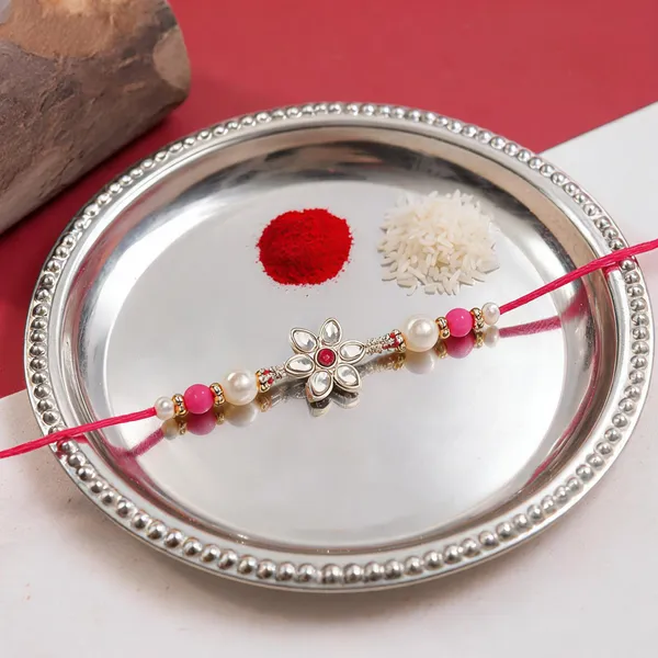 Pink_And_White_Thread_Beaded_Rakhi_For_Raksha_Bandhan_For_Brother