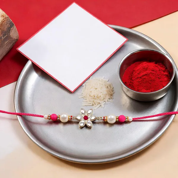 Pink_And_White_Thread_Beaded_Rakhi_For_Raksha_Bandhan_For_Brother