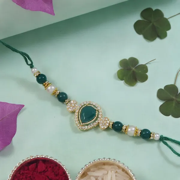 Delicate_Pearl_Beads_Green_Rakhi_with_Roli_Chawal_&_Rakshabandhan_Card